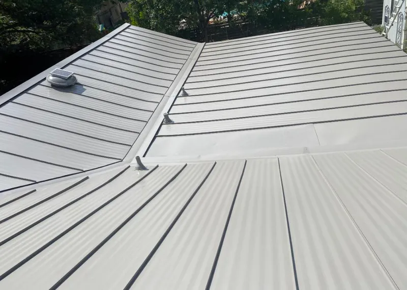 Solar attic fan installed on a metal roof for Roof Ventilation in San Leandro